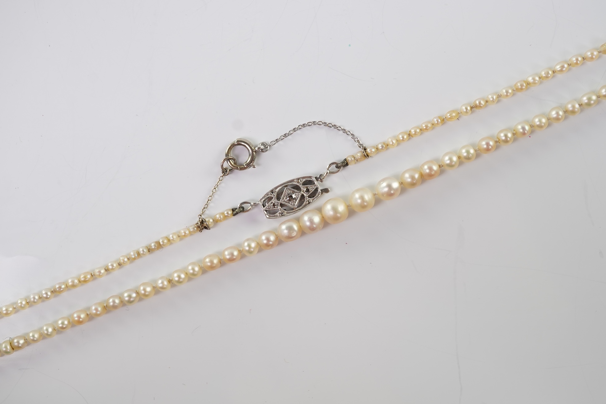A cultured pearl and diamond necklace, early 20th century